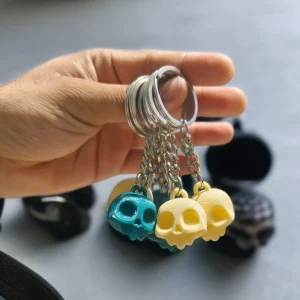 Skull Keychains 12 pcs (6 cream yellow, 6 blue)